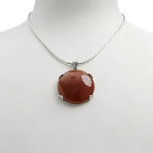 Ciondolo in Corniola tonda, con Argento