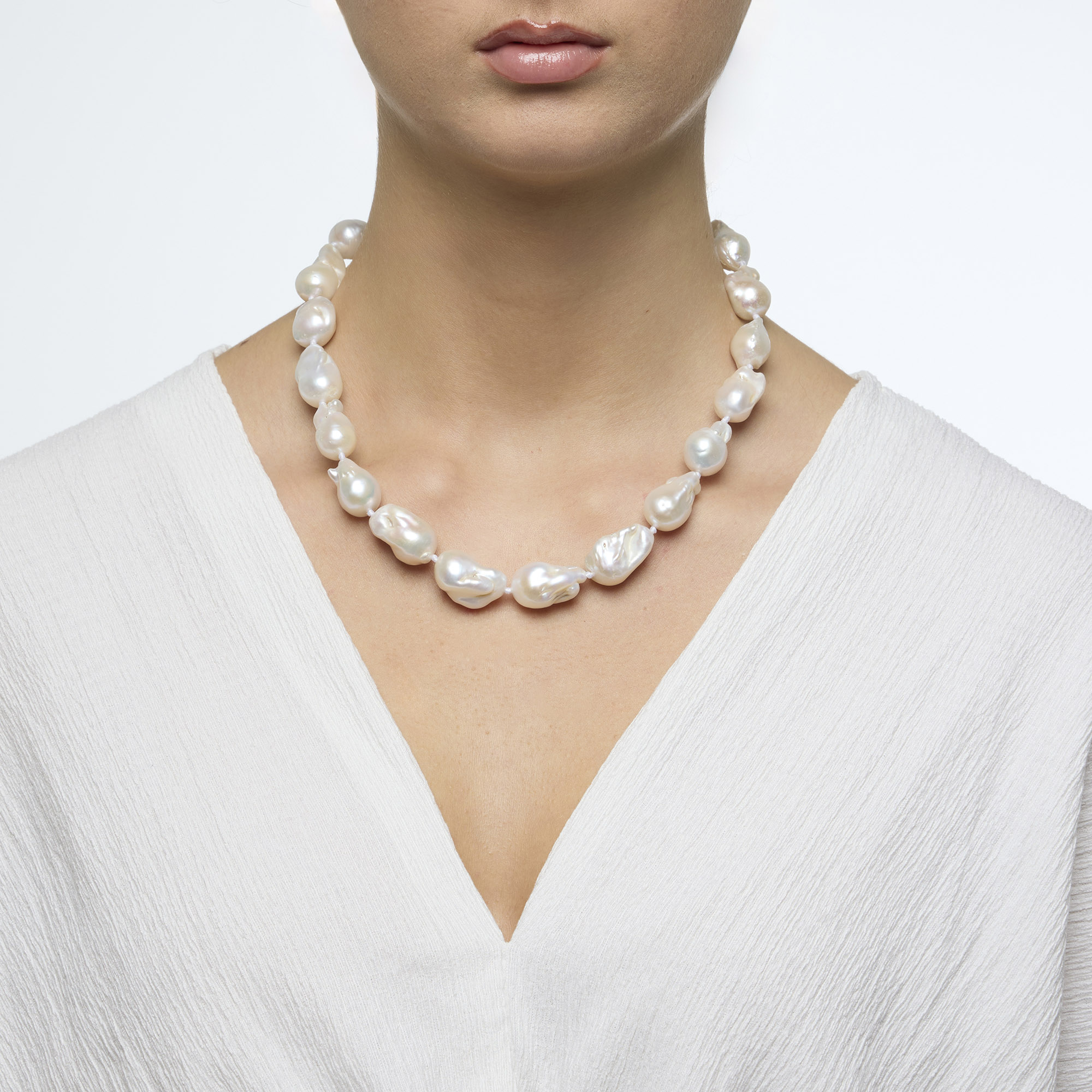 Korte halsketting in barokparels Korte halsketting in barokparels