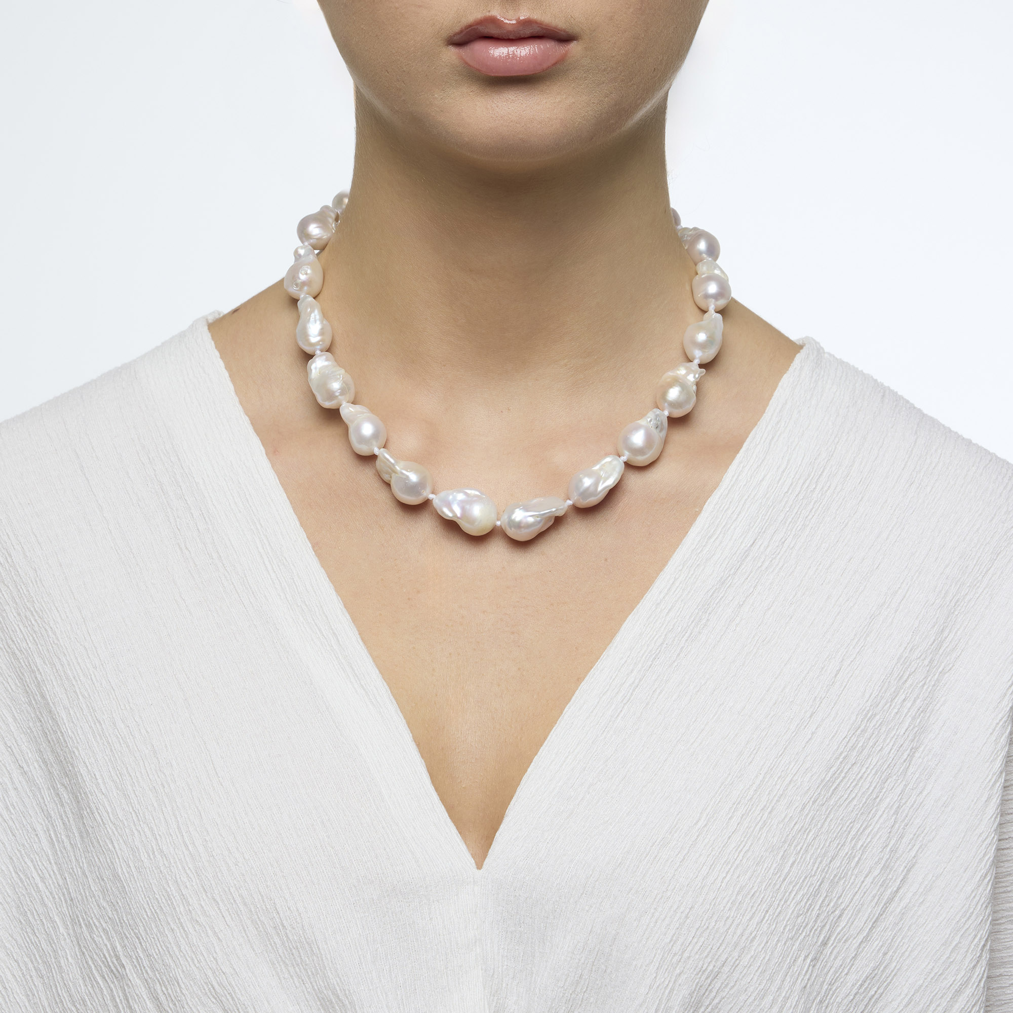 Korte halsketting in barokparels Korte halsketting in barokparels